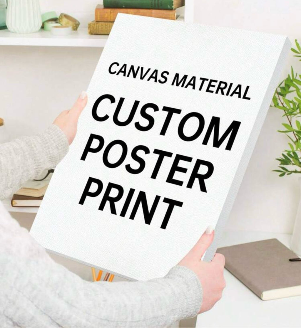 Person holding a sign that reads 'Canvas Material Custom Poster Print' in a home setting.
